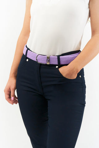 Lilac  stretch webbing Ladies Golf Belt comes with hand enamelled silver buckle with a embossed lady golfer in the belt colour . The belts have a stretch fit for comfort and will compliment or add a splash of colour to your outfit. One Size 8 -16  and 100% Cotton with PU tip.