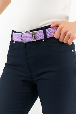 Lilac  stretch webbing Ladies Golf Belt comes with hand enamelled silver buckle with a embossed lady golfer in the belt colour . The belts have a stretch fit for comfort and will compliment or add a splash of colour to your outfit. One Size 8 -16  and 100% Cotton with PU tip.