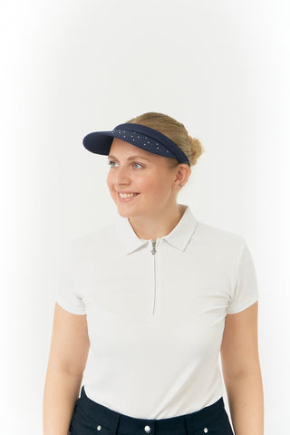 Navy Clip ladies golf visor,  100% polyester with quick-drying fabrics. The visor comes in a one size fits all design which clips around your head to hold it securely in place. It features a concealed magnet in in the strong curved, crystal detailed peak with a hand enameled flower look golf ball marker attached.  The headband features a soft lined absorbent towel.