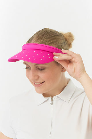 Pink Clip ladies golf visor,  100% polyester with quick-drying fabrics. The visor comes in a one size fits all design which clips around your head to hold it securely in place. It features a concealed magnet in in the strong curved, crystal detailed peak with a hand enameled flower look golf ball marker attached.  The headband features a soft lined absorbent towel.