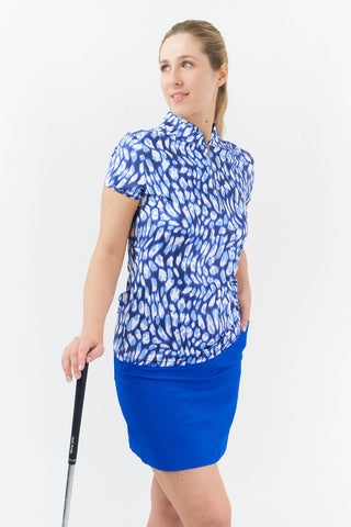 Traditional style lightweight Royal Blue Skort made in a four-way stretch polyester fabric. The skort has a small slit at the back, two front pockets and a zipper with button fastening. The buttons are etched with the Pure Golf logo, which also features on the two back pockets in very subtle stitching for an overall stylish effect. They come with matching attached undershorts.