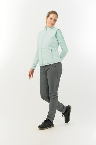 Frosted Sage Pure Golf Eve reversible ladies gilet for golf is insulated, winter-weight, patterned and reversible. It has been Insulated for warmth without being bulky. It has a unique frosted field, floral print  on one side and plain frosted sage on the other for versatility of wear. It has pockets on both sides and two-way zippers. The flattering quilting style and fit enhances your silhouette. 