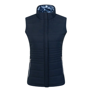 Pure Golf Eve reversible ladies gilet for golf is insulated, winter-weight, patterned and reversible. It has been Insulated for warmth without being bulky. One side features intricate Midnight Rose floral prints in navy and powder blue, while the other offers a classic plain navy option for versatility of wear. It has pockets on both sides and two-way zippers. The flattering quilting style and fit enhances your silhouette. 