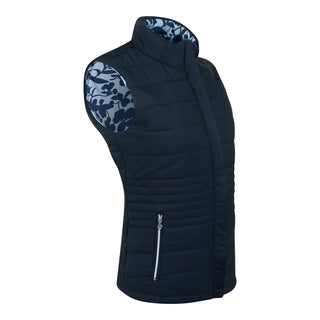 Pure Golf Eve reversible ladies gilet for golf is insulated, winter-weight, patterned and reversible. It has been Insulated for warmth without being bulky. One side features intricate Midnight Rose floral prints in navy and powder blue, while the other offers a classic plain navy option for versatility of wear. It has pockets on both sides and two-way zippers. The flattering quilting style and fit enhances your silhouette. 