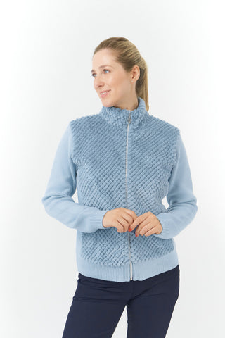 This Ladies Golf zip cardigan in Powder Blue is super soft and has been designed for ultimate comfort. It has a super soft faux fur collar and chest for style and warmth. Regular fit for a flattering silhouette