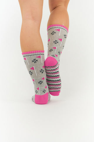 Ladies Grey and Pink Golf Crew Sock has a trendy golf flag design with lurex stripe detailing on the sole. Made from a soft, stretchy cotton blend fabric allowing breathability, with a cushioned sole, compression fit and Rib cuff for a snug fit. They are suited to UK sizes between 4 and 7. 85% Cotton, 13% Polyester, 2% Elastane.