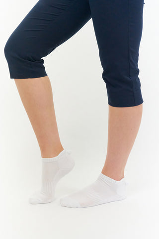 3 pair pack of ankle ladies golf socks, one pair in white with Navy detail on the sole and two pairs in white with Navy heals, toe, cuff and the word golf along the sole. With coordinating colour pom pom on the heel to help the socks hold their position. Made from a soft, stretchy cotton blend fabric allowing breathability, with a cushioned sole and compression fit. They are suited to UK sizes between 4 and 7. 85% Cotton, 13% Polyester, 2% Elastane.