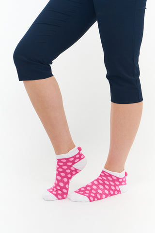 3 pair pack of multi spot in Pink, Blue & Aqua ankle ladies golf socks have a coordinating colour pom pom on the heel to help the socks hold their position. All socks feature the word "golf" on the sole.  Made from a soft, stretchy cotton blend fabric allowing breathability, with a cushioned sole and compression fit. They are suited to UK sizes between 4 and 7. 85% Cotton, 13% Polyester, 2% Elastane.