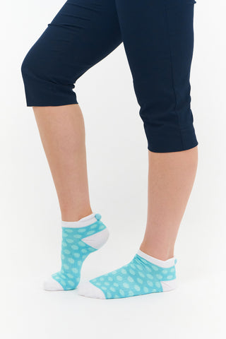 3 pair pack of multi spot in Pink, Blue & Aqua ankle ladies golf socks have a coordinating colour pom pom on the heel to help the socks hold their position. All socks feature the word "golf" on the sole.  Made from a soft, stretchy cotton blend fabric allowing breathability, with a cushioned sole and compression fit. They are suited to UK sizes between 4 and 7. 85% Cotton, 13% Polyester, 2% Elastane.