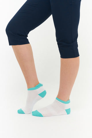 3 pair pack of ankle ladies golf socks In white with coloured heals, toe and cuff in Pink, Blue & Aqua, and matching word golf along the sole. With coordinating colour pom pom on the heel to help the socks hold their position. Made from a soft, stretchy cotton blend fabric allowing breathability, with a cushioned sole and compression fit. They are suited to UK sizes between 4 and 7. 85% Cotton, 13% Polyester, 2% Elastane.