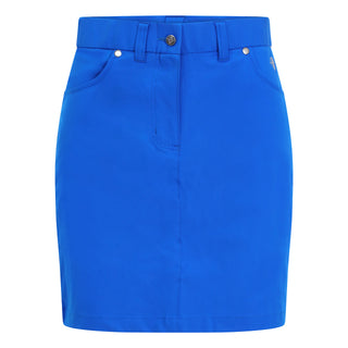 Traditional style lightweight Royal Blue Skort made in a four-way stretch polyester fabric. The skort has a small slit at the back, two front pockets and a zipper with button fastening. The buttons are etched with the Pure Golf logo, which also features on the two back pockets in very subtle stitching for an overall stylish effect. They come with matching attached undershorts.