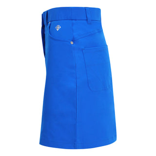 Traditional style lightweight Royal Blue Skort made in a four-way stretch polyester fabric. The skort has a small slit at the back, two front pockets and a zipper with button fastening. The buttons are etched with the Pure Golf logo, which also features on the two back pockets in very subtle stitching for an overall stylish effect. They come with matching attached undershorts.