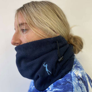 Navy soft fleece lined women's golf snood with embroidered lady golfer will keep your neck warm on those cold days golfing! The soft fleece lining of this snood is lightweight and provides extra warmth and comfort on the golf course. It has an adjustable toggle to provide a snug or loose fit and is one size.