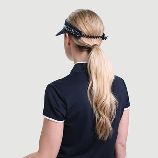 Navy telephone wire crystal ladies golf visor constructed with quick-drying fabrics. The visor comes in a one size fits all. It also features a concealed magnet  in the strong curved peak with a hand enameled lace effect flower shaped golf ball marker. The headband features a soft lined absorbent towel and is crystal-adorned. 