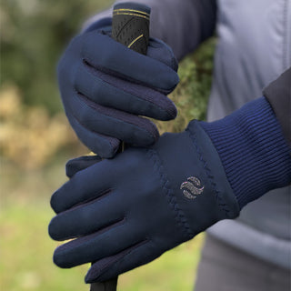 Navy Winter Golf Gloves are perfect for keeping your hands warm. Made from a polar stretch fabric featuring a ribbed cuff and silver pure golf design which is 100% Polyester that is breathable and soft. The all weather fabric in the palm gives enhanced durability and grip for when you are playing. Machine washable and available in Small, Medium and Large.